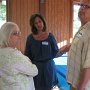 Mary Snook Kooser (left), Sharidy Blackwood (center), and Danl Blackwood must be having an interesting conversation...  :-)